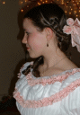 White sheer dress with pink silk ruching.